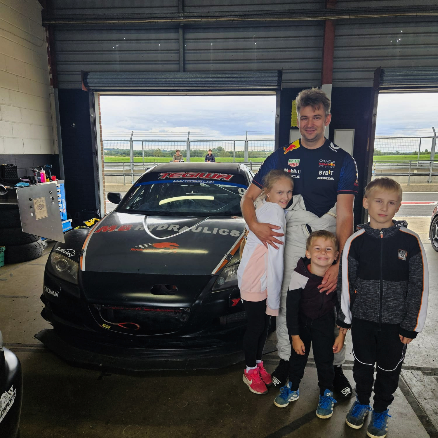 Mazda rx8 race car in garage at snetterton