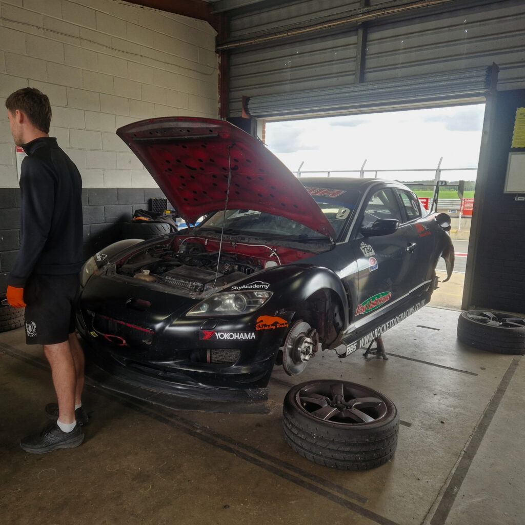 Mazda rx8 race car in garage at snetterton